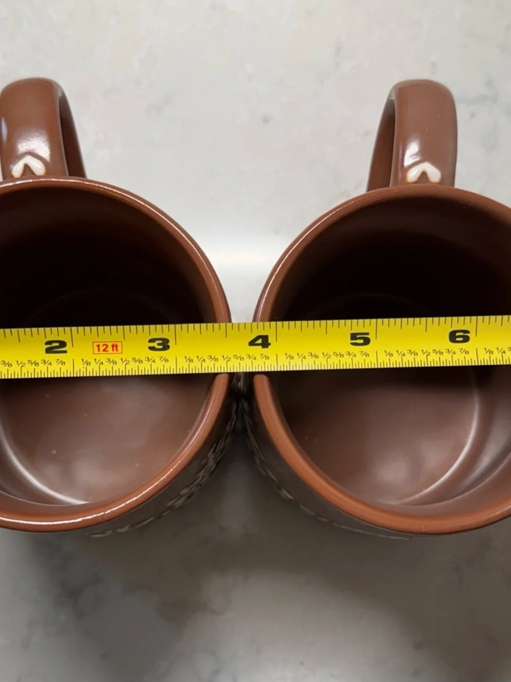 Pottery Barn Brown Ceramic Mug with White Snowflake Design